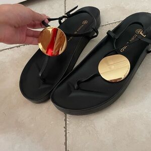 Tory Burch Black Sandals with Gold Accents